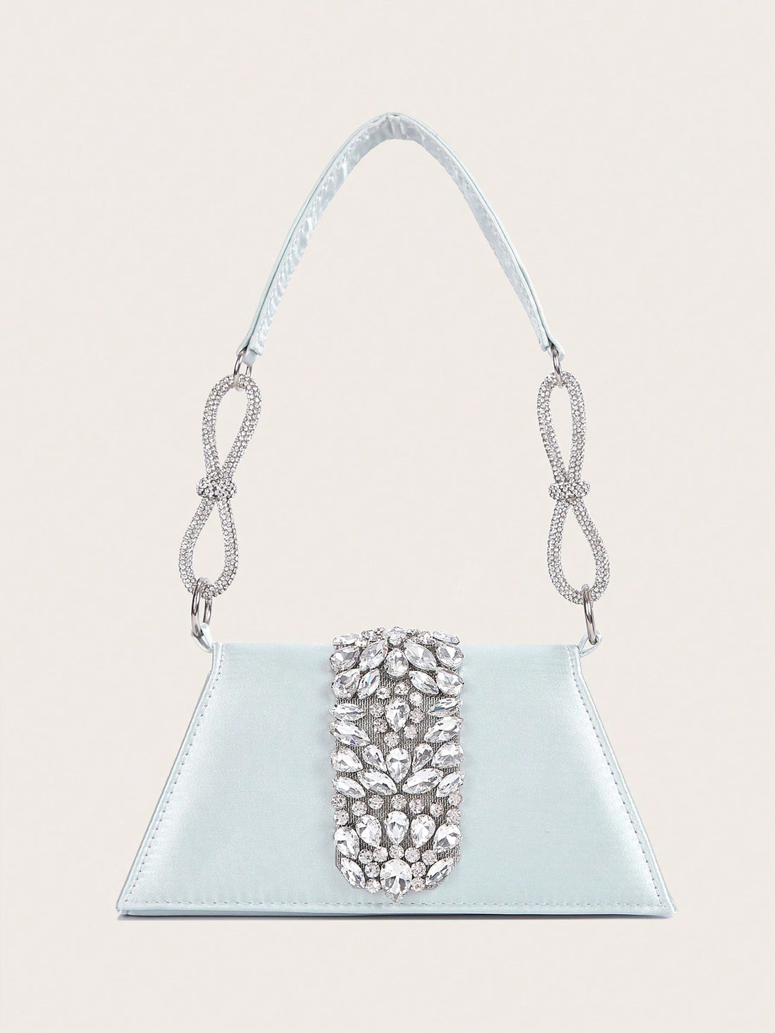 This Luxe Black Crossbody Bag with Diamond Bow is the perfect accessory for any evening event. With its elegant design and diamond bow accent, it's sure to add a touch of sophistication to your outfit. The crossbody style allows for hands-free convenience while the spacious interior can hold all your essentials. Perfect for parties and weddings.