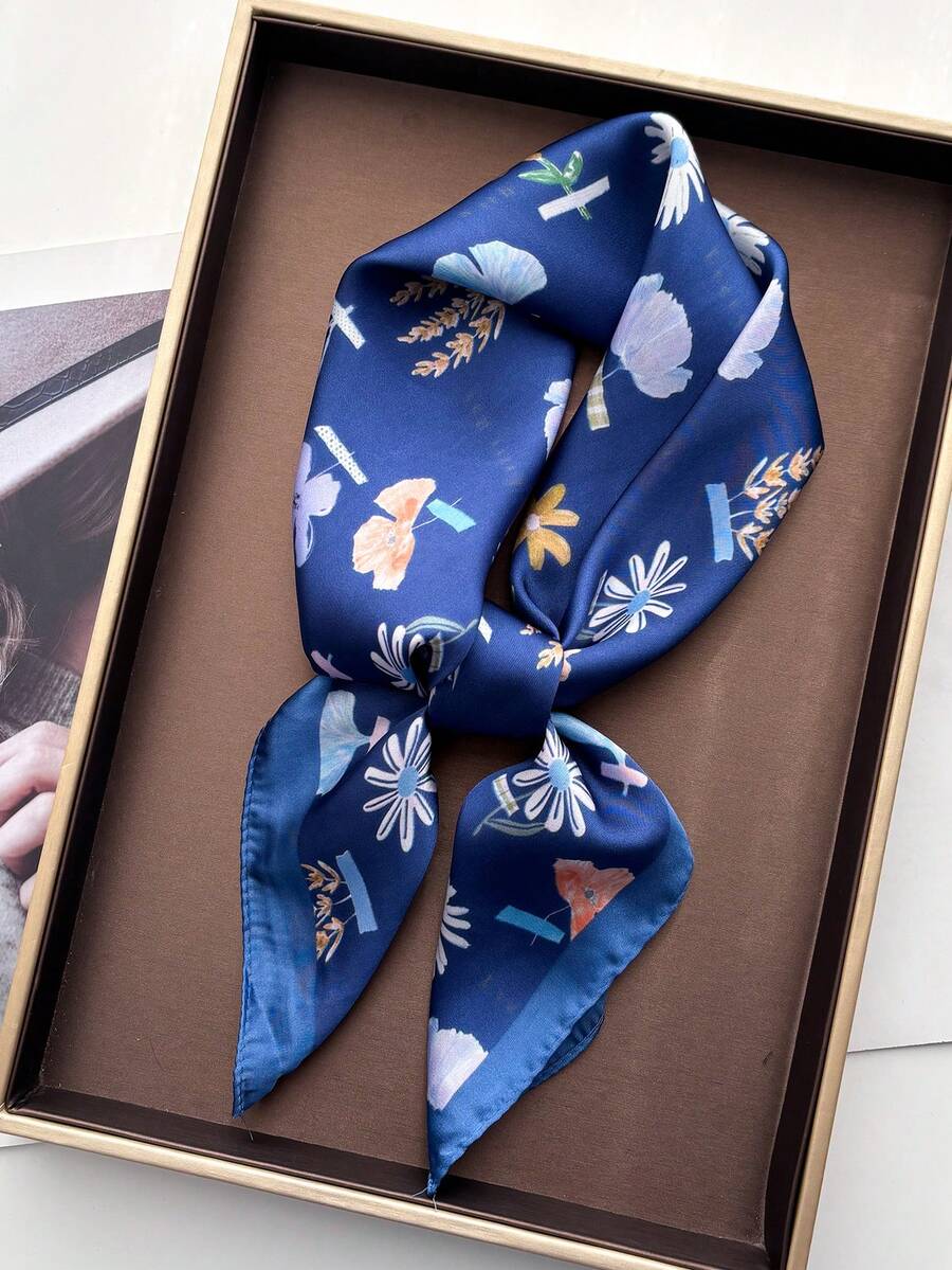 Elevate your everyday style with this luxurious silk satin scarf headband, featuring an elegant ditsy floral pattern. Crafted from premium materials, it glides smoothly over hair and skin, reducing friction and frizz while adding a touch of sophistication to any look. Versatile and practical, this multifunctional accessory works as a headband, neck scarf, hair wrap, or travel companion. 