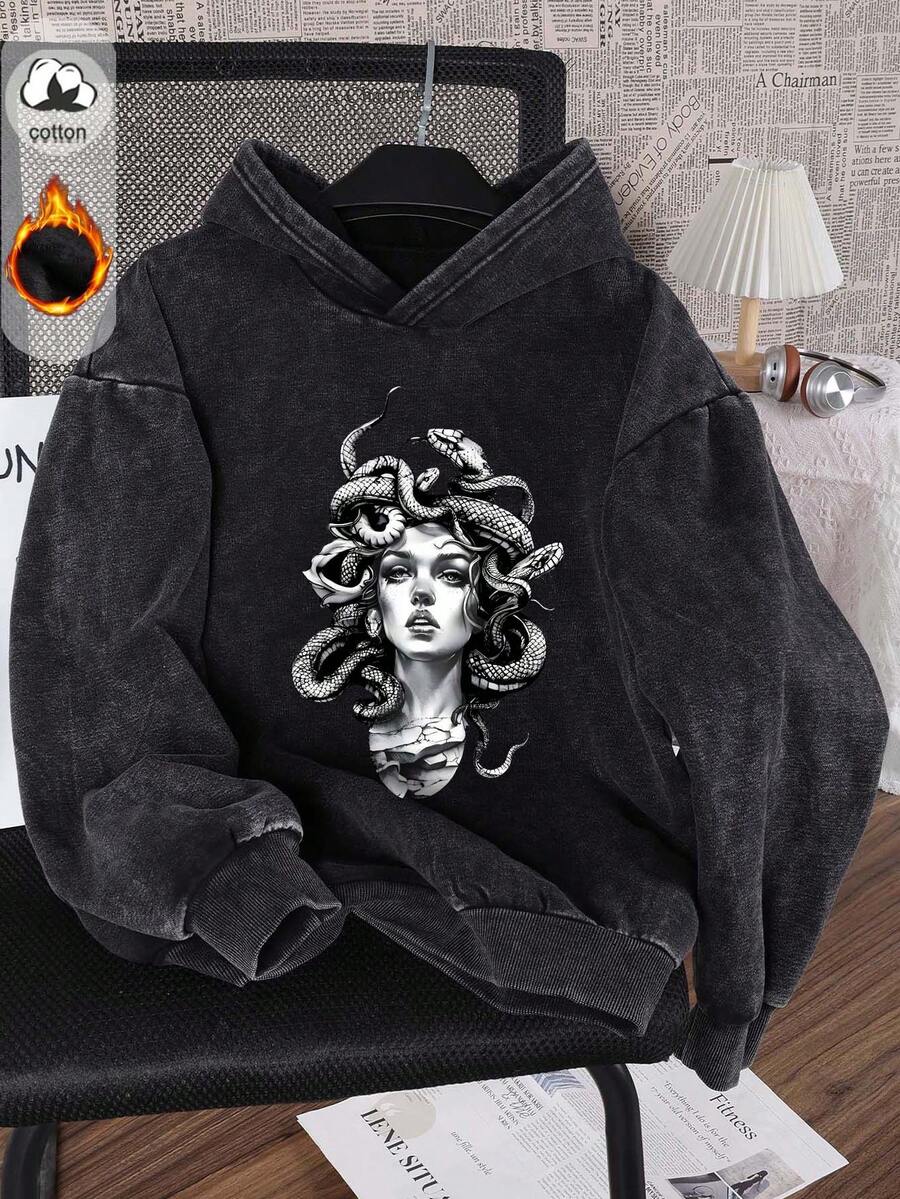 Front hanger view of washed black Medusa graphic pullover hoodie