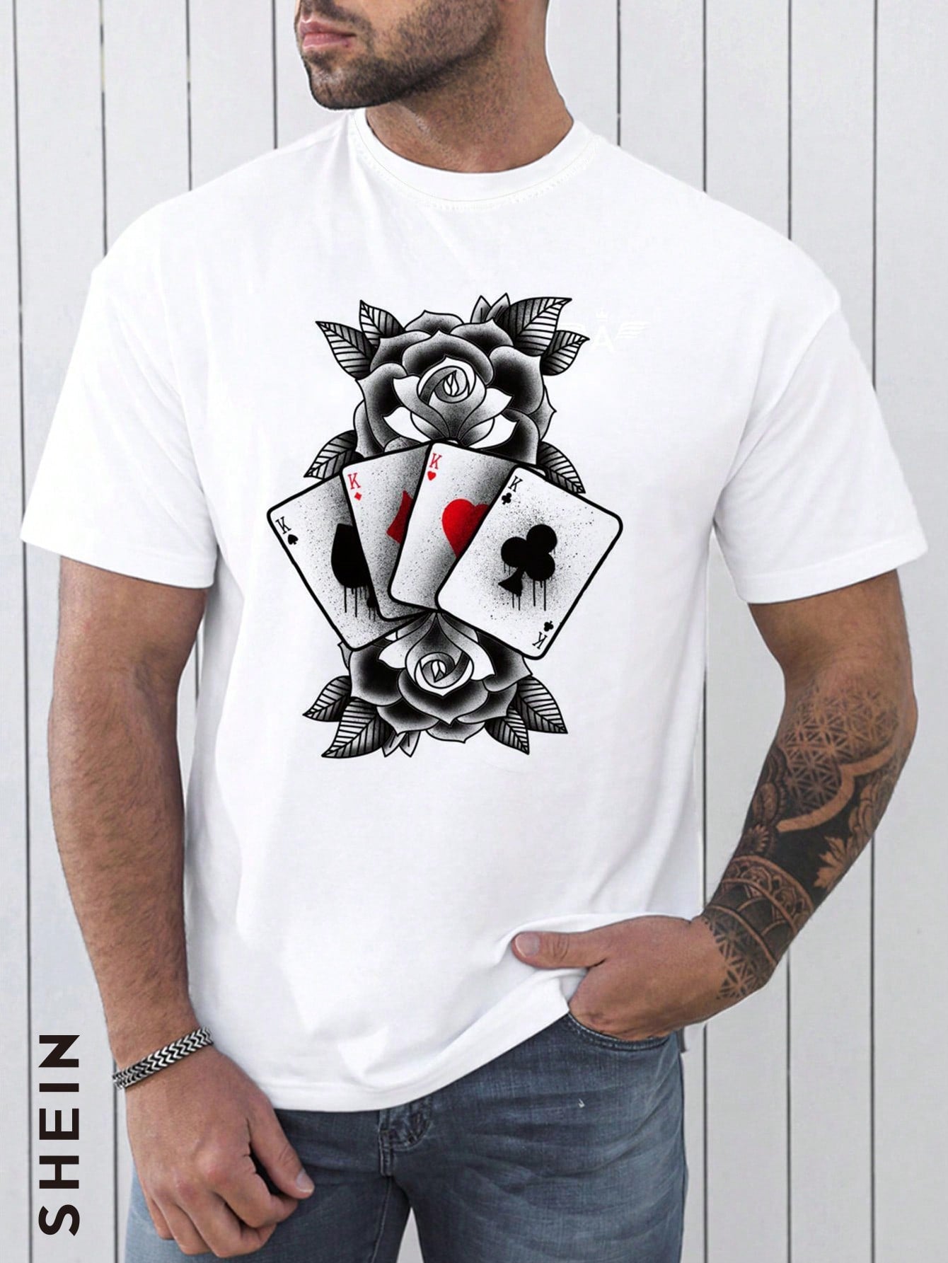 Introducing our Men Four Playing Card and Flower Pattern Print Tshirt, perfect for the stylish and playful man. With a unique design featuring four playing card suits and a floral pattern, this tshirt is a one-of-a-kind addition to your wardrobe. Made with high-quality materials, it offers both comfort and style. 