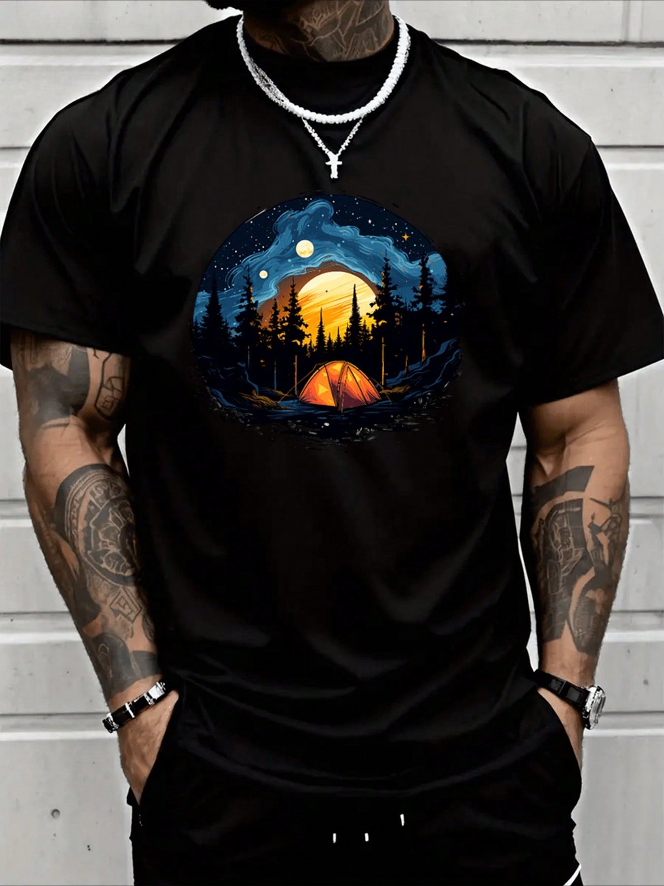Add a pop of color to your wardrobe with this Men's Casual Round Neck Tee. Made from 100% heavy cotton, this tee features a unique watercolor design of a mountain campfire and lake. Perfect for a casual day out or lounging at the lake. (Get cozy in style!)