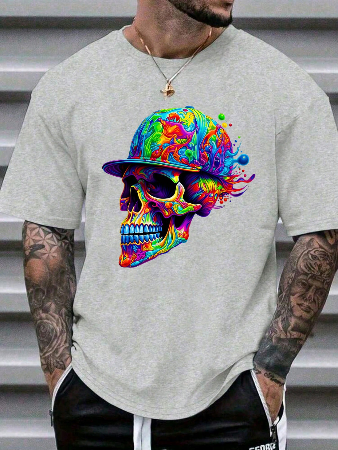 Channel your inner rebel with this Men's Casual Skull Print T-Shirt. Perfect for hot summer days, this shirt features a round neck and short sleeves, with a bold skull print design. Stand out from the crowd and add some edge to your wardrobe with this unique and stylish tee.