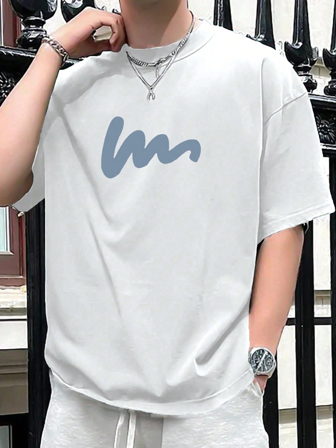 Looking for a stylish and comfortable summer shirt? Look no further! Our Men's Casual Summer Drop Shoulder T-Shirt features a trendy drop shoulder design and a unique letter print. Stay cool and on-trend this season with this must-have piece.
