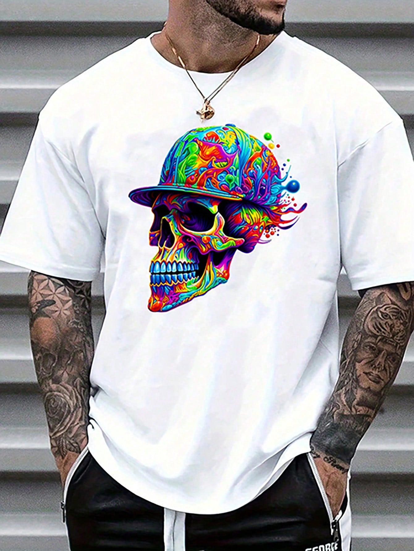 Stay cool and stylish this summer with our Men's Edgy Skull Print Crew Neck Tee. Made with high-quality materials, this tee offers both comfort and edgy style. The crew neck design and breathable fabric will keep you cool during hot days. Elevate your wardrobe with this must-have tee.