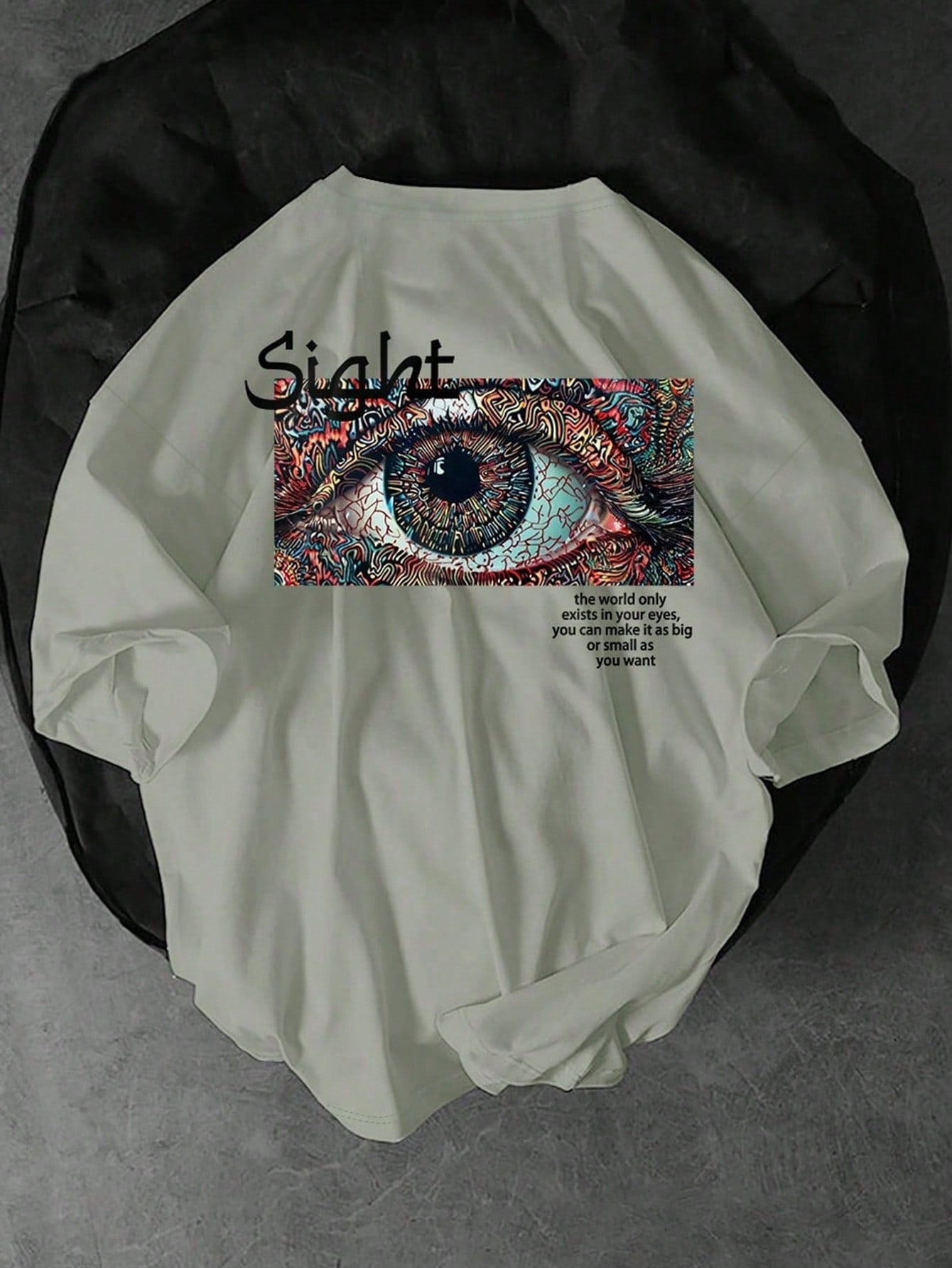 Get ready to turn heads with this Men's Eye Graphic Tee! The trendy round neck and short sleeves add a touch of style to any outfit. Guaranteed to make a statement, this shirt is perfect for the fashion-forward man who isn't afraid to stand out.