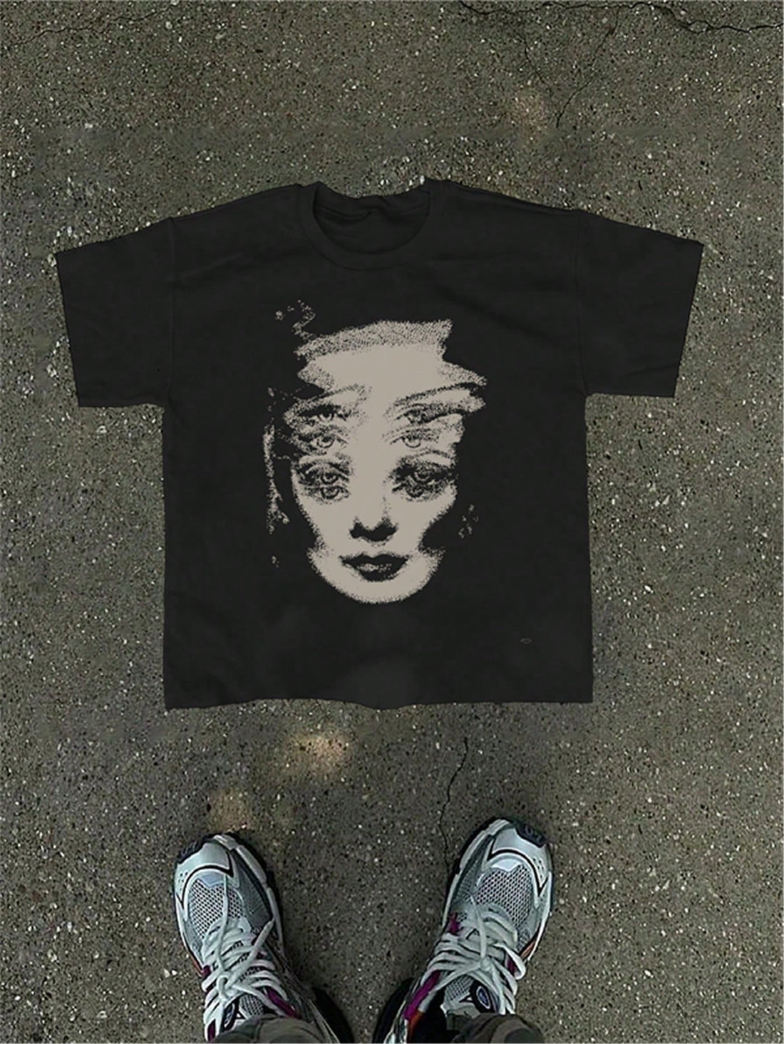 Upgrade your wardrobe with our must-have Men's Graphic Print Casual Black Tee. With a unique and stylish graphic print, this tee is the perfect addition to any casual outfit. Made with high-quality materials, it's comfortable to wear all day long. Don't miss out on this essential piece for any fashion-forward man.