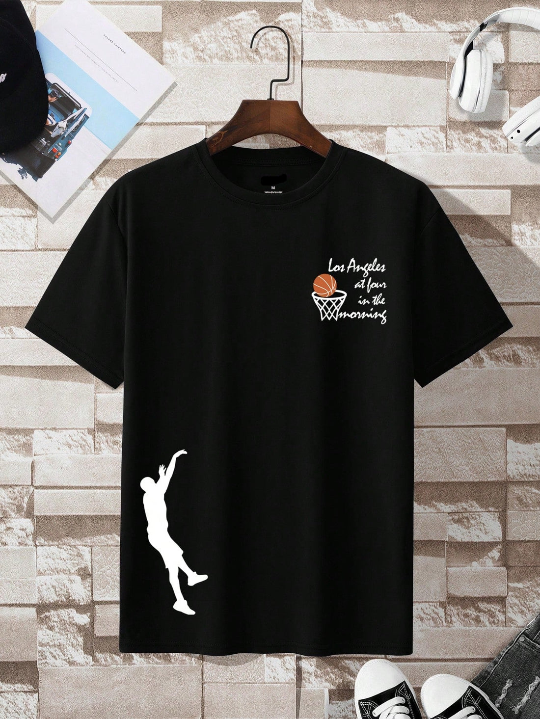 Make a statement with this bold men's graphic tee featuring a unique letter design. Perfect for everyday style, this tee adds a touch of fun and quirkiness to any outfit. Stand out from the crowd with this playful and stylish shirt!