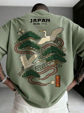 Exude Zen-Inspired Sophistication in Our Men's Minimalist Japanese Crane Print T-Shirt!

Experience the perfect fusion of traditional Eastern artistry and sharp, modern tailoring. This stunning Japanese crane print t-shirt is meticulously designed for the man who values a high-fashion, 