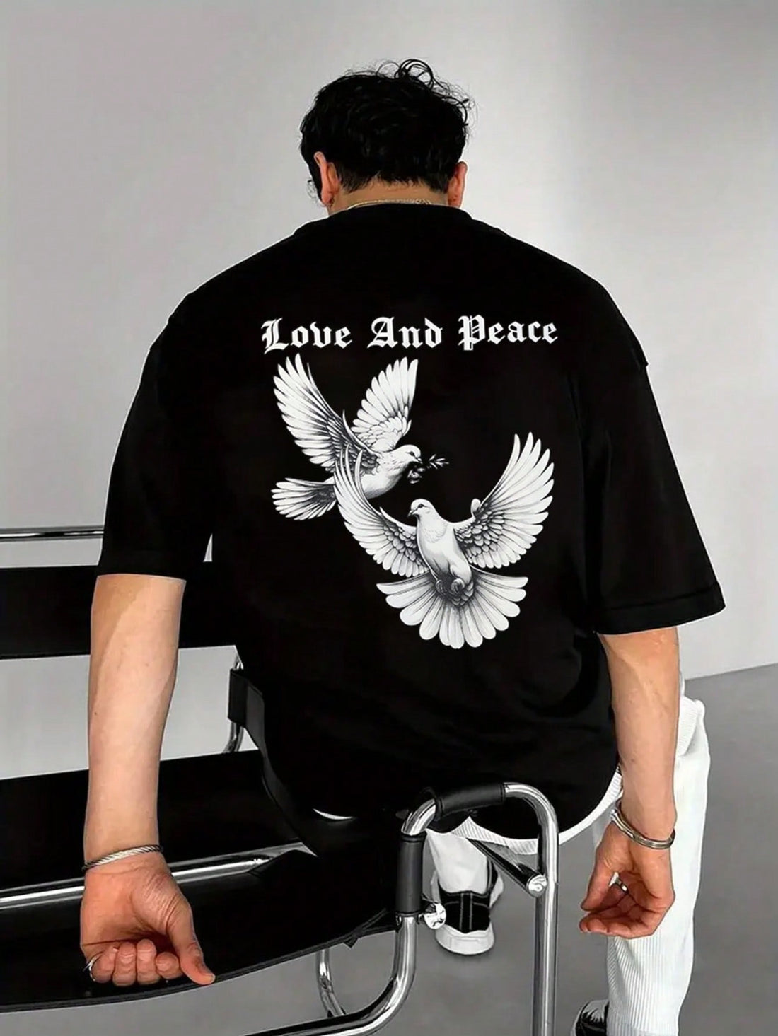 Unleash your laid-back style with our Men's Of Peace Graphic T-Shirt! This crew neck wonder isn't just another tee – it's your go-to companion for sunny days and warm nights. The eye-catching peace graphic makes a statement while you stay cool and comfortable. Perfect for pairing with shorts, jeans, or whatever your carefree heart desires this spring and summer!