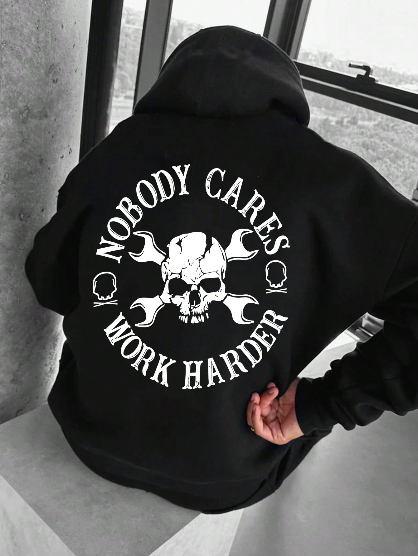 Unleash your edgy side with our Men's Skull Letter Graphic Drop Shoulder Hoodie. This stylish and comfortable hoodie features a bold skull graphic, making it a perfect choice for those who like to stand out. Embrace your dark side in style with this must-have piece for any fashion-forward man.