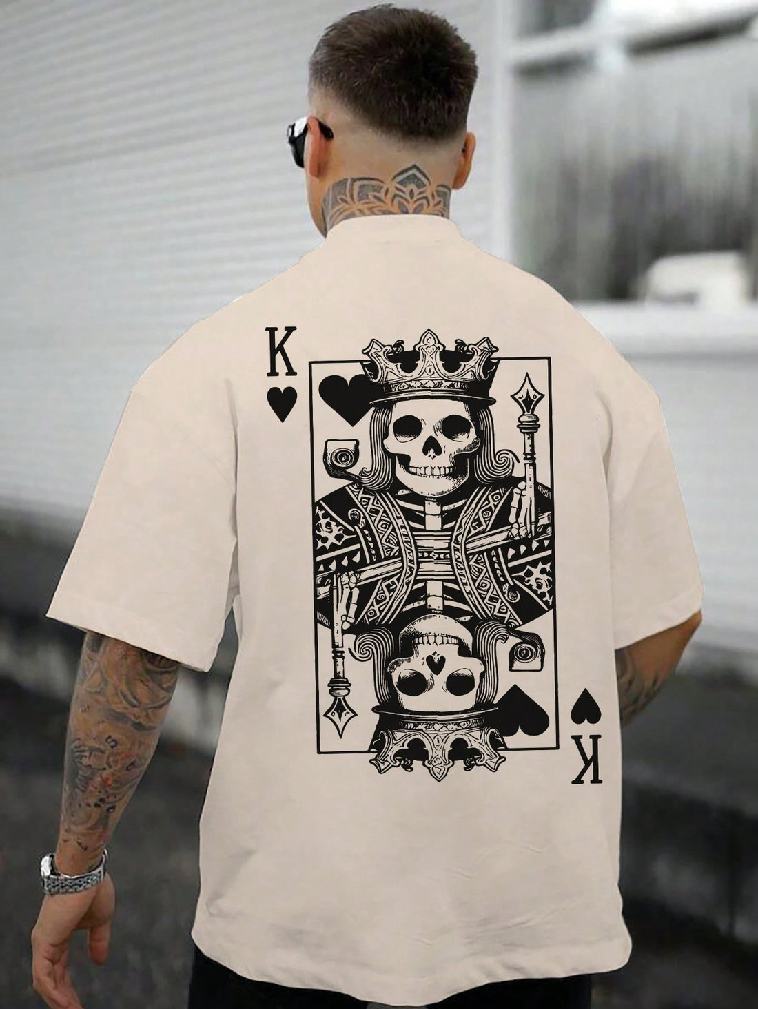 Upgrade your wardrobe with our Men's Skull Letter Printed Summer Tee. Made for all seasons, this stylish statement piece is sure to make a lasting impression. The bold skull and letter design is perfect for those who want to make a statement. Crafted with high-quality materials, this tee offers both style and comfort.