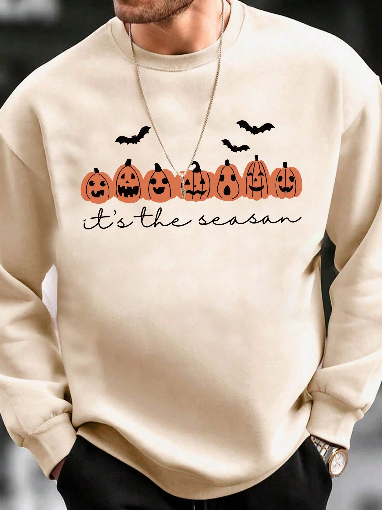 This Men's Spooky Halloween Pumpkin and Bat Print Sweatshirt is perfect for the Halloween season, featuring a fun and festive print of pumpkins and bats. Made with high-quality materials, it offers both comfort and style. Show off your Halloween spirit with this unique sweatshirt.
