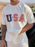 Show off your patriotic spirit in style with this Men's Summer Casual T-Shirt! Featuring a bold American flag print, a comfy round neck, and breezy short sleeves, it’s perfect for sunny days and backyard barbecues. Lightweight and cool, this tee keeps you looking sharp while staying effortlessly comfortable. Whether you’re hitting the beach or just chilling with friends, this shirt adds a fun, casual vibe to your summer wardrobe.