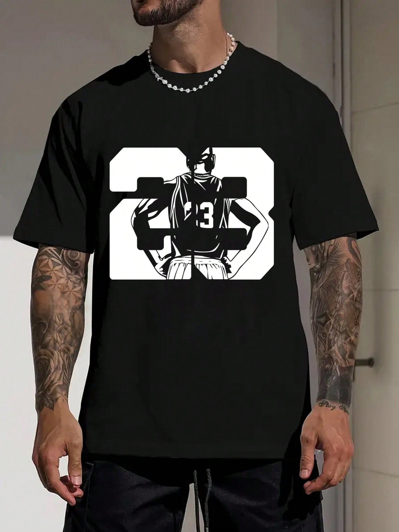 Score a slam dunk with this Men's Summer Casual T-Shirt! Featuring a basketball player print and the legendary number 23, this shirt is perfect for any baller. Keep cool and show off your love for the game in this quirky and stylish tee.