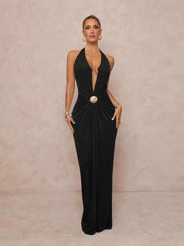 Turn heads and let your confidence shine in this Metallic Halter Neck Dress. Featuring an elegant deep V neckline, it’s perfect for beach days or festival nights. Its shimmering metallic finish catches every ray of sun, adding a playful sparkle to your look. Lightweight and breezy, it keeps you cool while making a bold style statement wherever you go. Get ready to dance, dazzle, and delight in this effortlessly chic dress made just for fun-loving women like you!