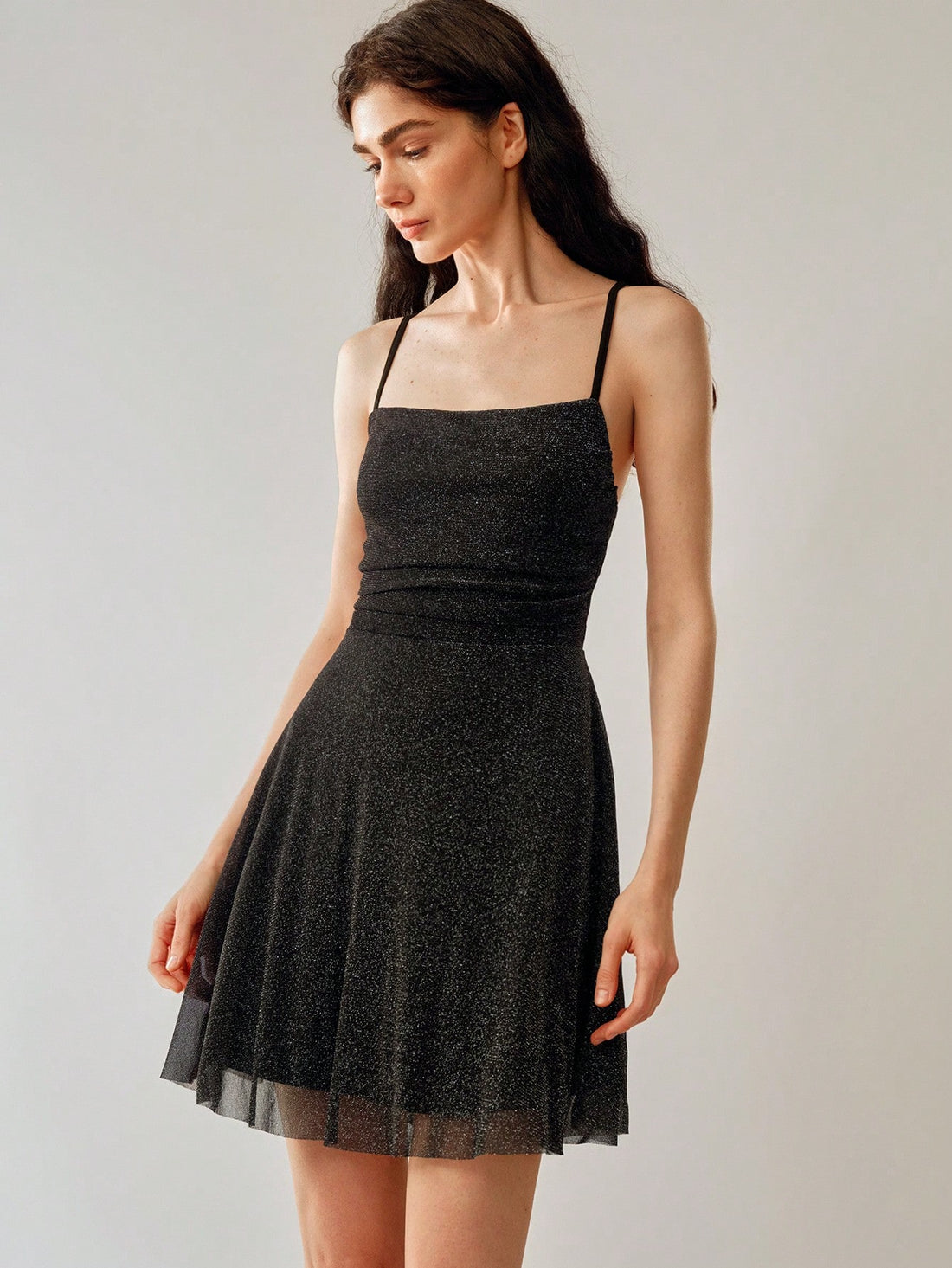 Get ready to shine this spring/summer with our Metallic Spaghetti Strap Gloss Knit Mini Dress! This dress effortlessly combines comfort and style, making it the perfect addition to your wardrobe. With its unique metallic shine and flattering spaghetti straps, you'll be sure to turn heads wherever you go. Upgrade your style game today!