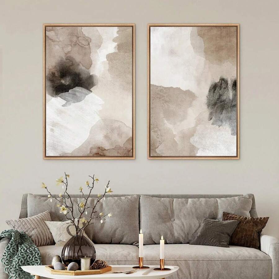 Living room view of two-piece beige and brown abstract framed wall art above gray sofa