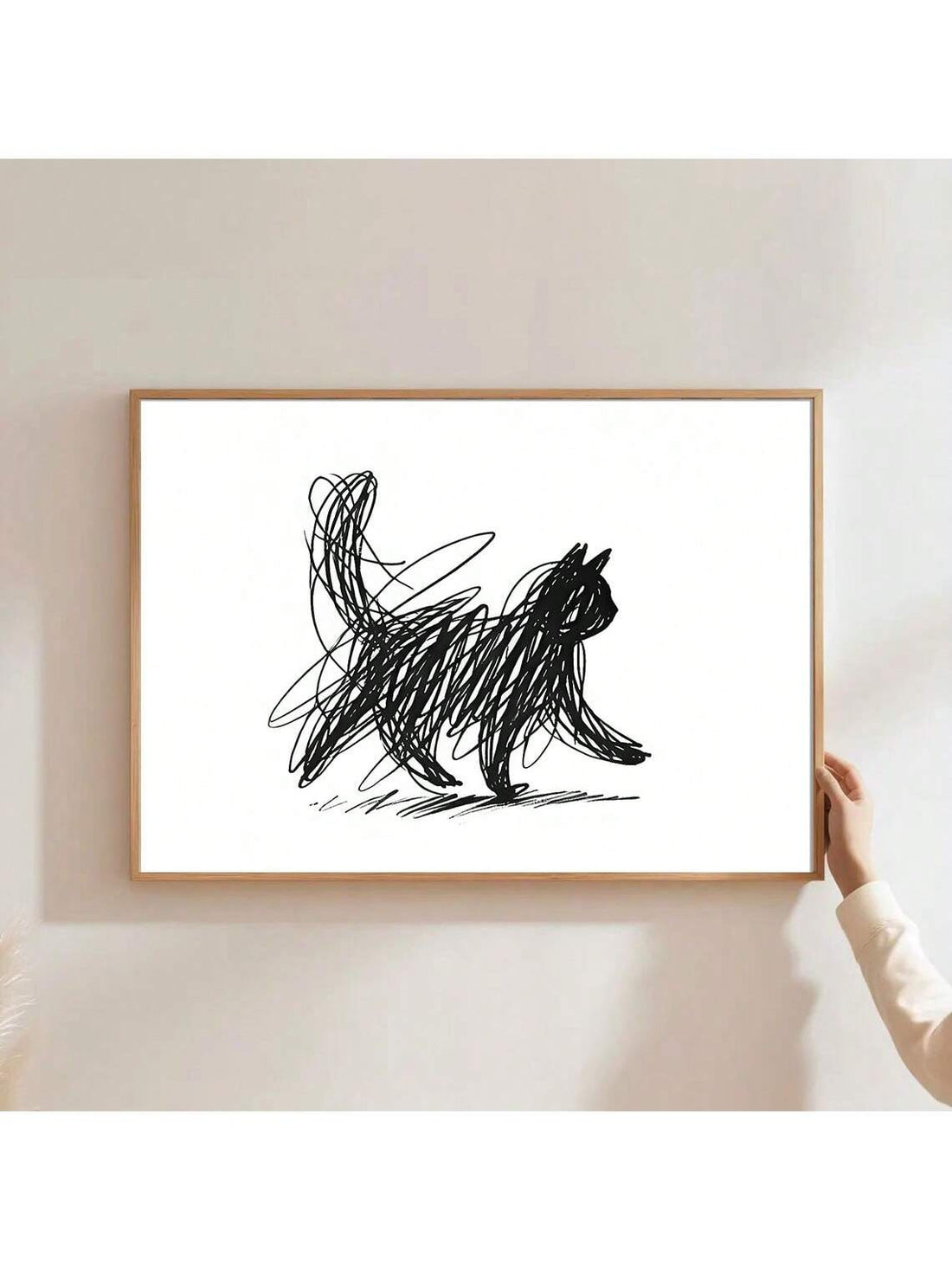 Celebrate your love for cats with this playful Minimalist Cat Scribble Wall Art Poster. Its simple, modern lines capture your feline friend's charm in a fun and stylish way, perfect for brightening any space. Whether in your living room, bedroom, or office, this canvas print adds a touch of whimsy and a contemporary vibe that cat lovers will adore.