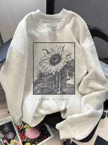 Front view of light heather-gray Grow in Grace sunflower graphic crewneck sweatshirt