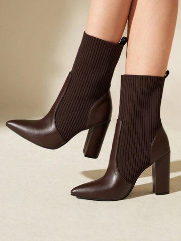 Elevate your style with our Minimalist Pointed Toe High Heel Boots. These elegant boots effortlessly combine fashion and ease, perfect for everyday wear. The pointed toe and high heel add a touch of sophistication to any outfit. Step into effortless style and elegance with these must-have boots!