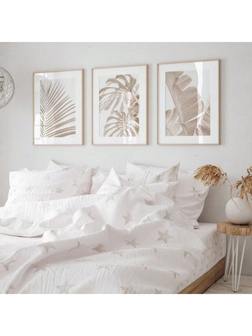Bring a fresh vibe to any room with this Modern 3-Piece Tropical Leaf Wall Art Set. Perfectly unframed and printable, these playful prints add a breath of tropical calm to your minimalist space. Easy to mix, match, and hang your way to a breezy, lively atmosphere!