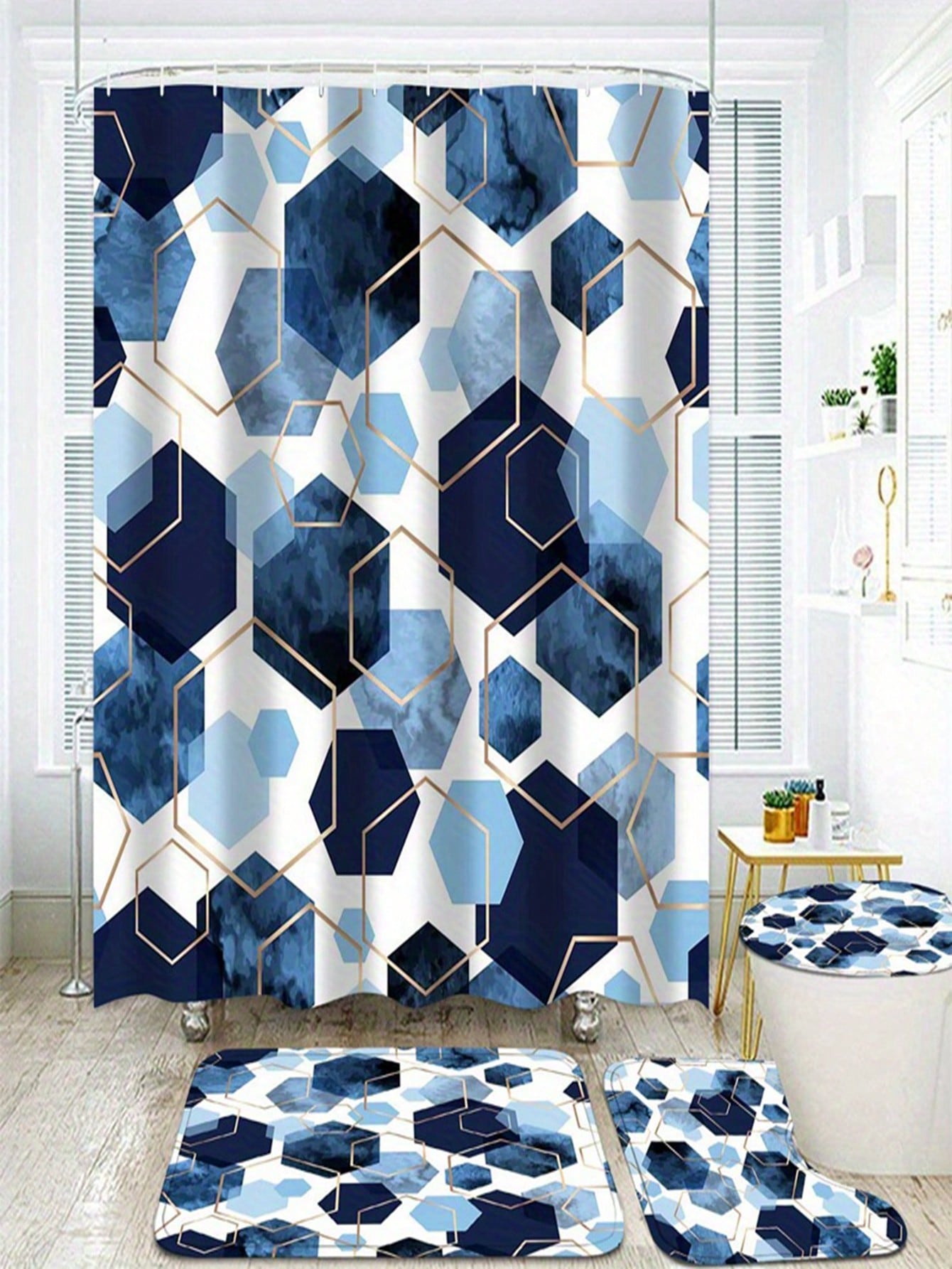 Add a splash of playful modern design to your bathroom with our geometric navy blue shower curtain and matching rugs set. Perfect for tying together your bathroom decor, this set adds a touch of style and fun to your daily routine. (2 exclamation points)