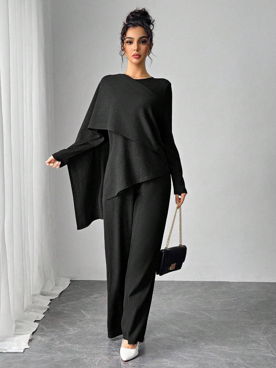 Effortlessly put-together mornings just got easier! This charming 2-piece set pairs a graceful blouse with tailored pants, giving you that "I woke up like this" vibe without the effort. Perfect for anyone who loves looking polished while keeping things comfortable and modest. Mix, match, or wear together—your wardrobe just got a whole lot more versatile. Casual elegance has never been this fun!