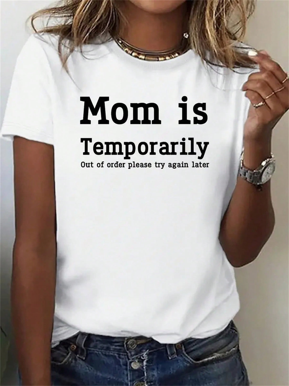Keep the summer vibe going with this playful and casual graphic tee for all the busy moms out there! Featuring a unique design and a quirky phrase, it's the perfect way to show off your fun and humorous side while also taking a break from mom duties. Get yours now and let the world know that mom is temporarily out of service (wink, wink)!