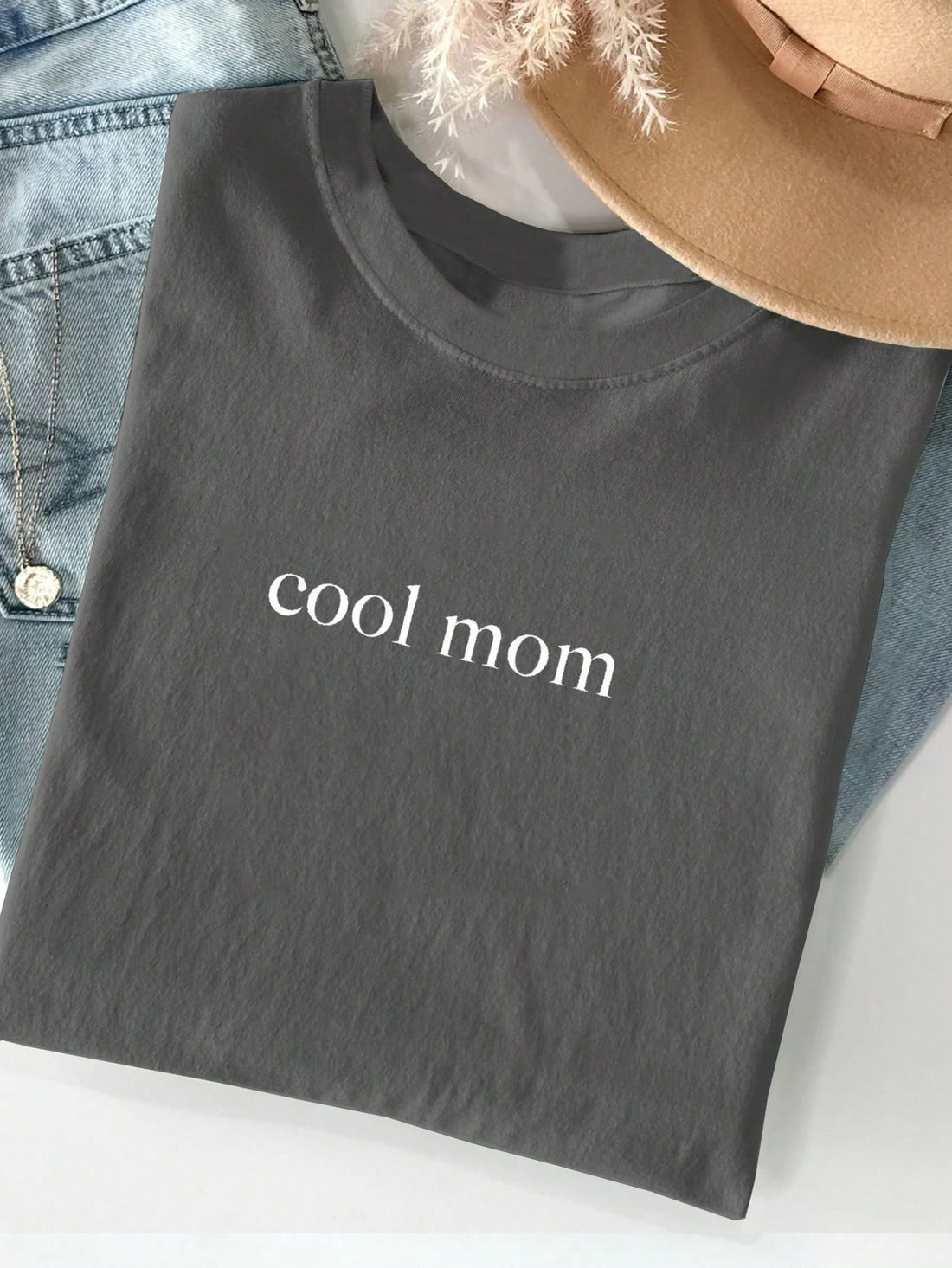 Join the Cool Moms Club with this Mom Life Vibes t-shirt! Perfect for celebrating Mother's Day in style, this shirt is a must-have for any mom. Show off your laid-back, playful side with this quirky and fun design. Don't miss out, grab yours today!