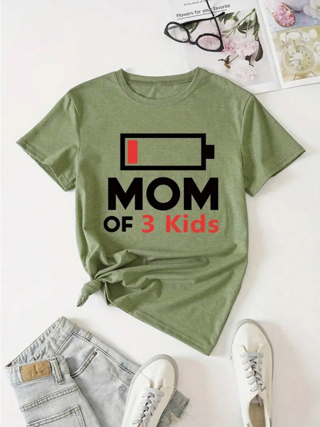 This shirt is perfect for any mom of 3 who wants to show off their cool mom style. Featuring a trendy slogan print and short sleeves, this t-shirt is sure to make a statement wherever you go. Be the envy of all the other moms with this unique and playful top. (Don't be a regular mom, be a cool mom!)