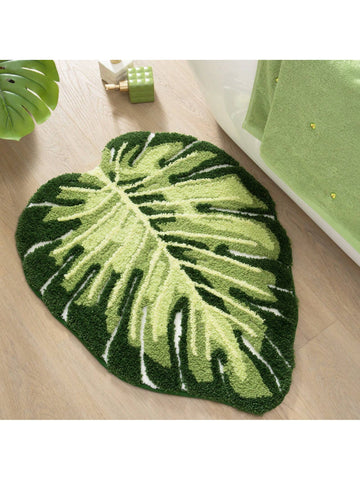 Introducing our Monstera Leaf Shaped Non-Slip Bath Mat - the perfect addition to your bathroom! With its absorbent and washable design, this floor carpet not only looks stylish but also keeps your feet slip-free. Made with high-quality materials, it provides durability and comfort. Upgrade your bathroom experience now!
