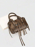 Sleek motorcycle-inspired crossbody bag designed for the modern woman on the move. Features a structured silhouette with adjustable shoulder strap for versatile wear—wear it crossbody for hands-free convenience or over your shoulder for classic style. Durable construction with multiple compartments keeps essentials organized. Perfect for daily commutes, weekend outings, or travel. Compact yet spacious, this fashion-forward bag combines edgy aesthetics with practical functionality.