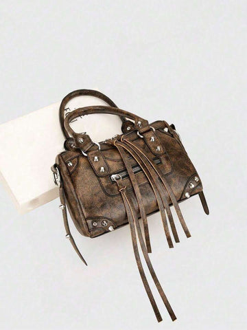 Sleek motorcycle-inspired crossbody bag designed for the modern woman on the move. Features a structured silhouette with adjustable shoulder strap for versatile wear—wear it crossbody for hands-free convenience or over your shoulder for classic style. Durable construction with multiple compartments keeps essentials organized. Perfect for daily commutes, weekend outings, or travel. Compact yet spacious, this fashion-forward bag combines edgy aesthetics with practical functionality.