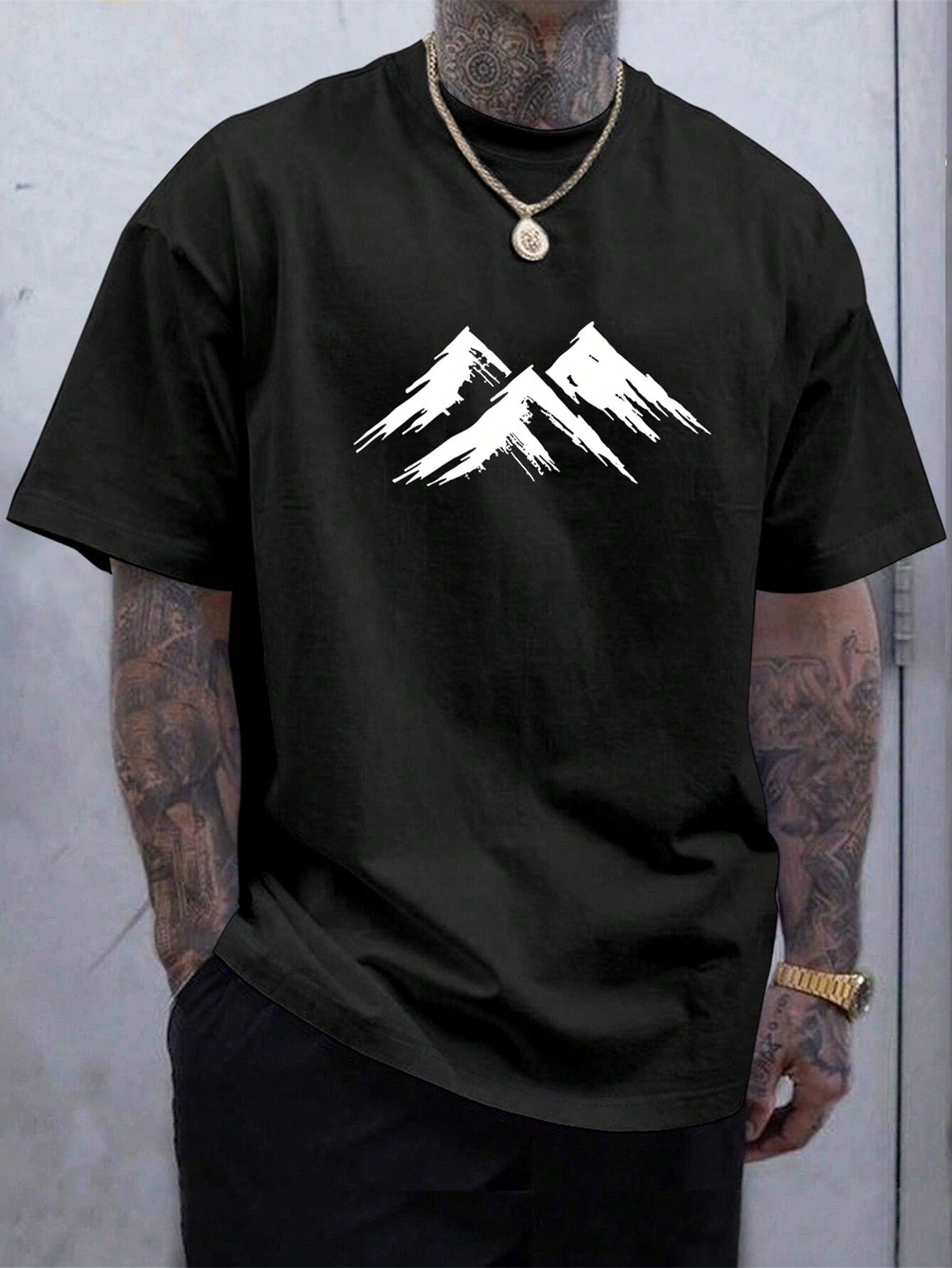 Conquer your day with style in our Mountain Adventure Graphic Tee! This casual black short sleeve is perfect for any occasion, adding a touch of adventure to your everyday look. Embrace the outdoors and express your playful side with this quirky and fun graphic tee.