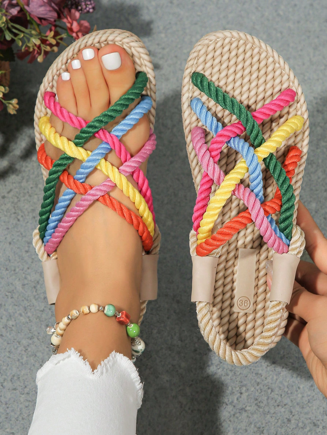 These Multicolor Rainbow Flat Summer Sandals bring style and comfort together, making them the perfect addition to your summer wardrobe. The mule style and weaved bottom provide ultimate comfort, while the slip-on wrap toe makes them easy to wear. Say hello to a colorful and fashionable summer!