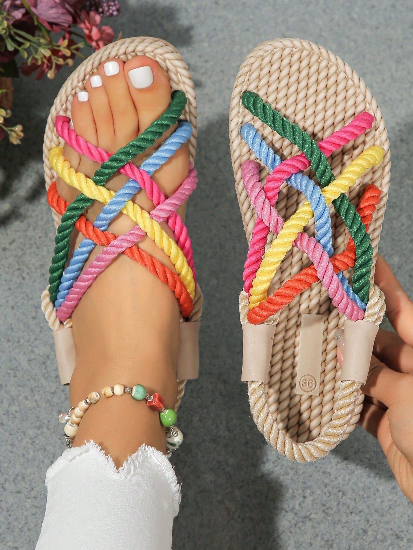 These Multicolor Rainbow Flat Summer Sandals bring style and comfort together, making them the perfect addition to your summer wardrobe. The mule style and weaved bottom provide ultimate comfort, while the slip-on wrap toe makes them easy to wear. Say hello to a colorful and fashionable summer!