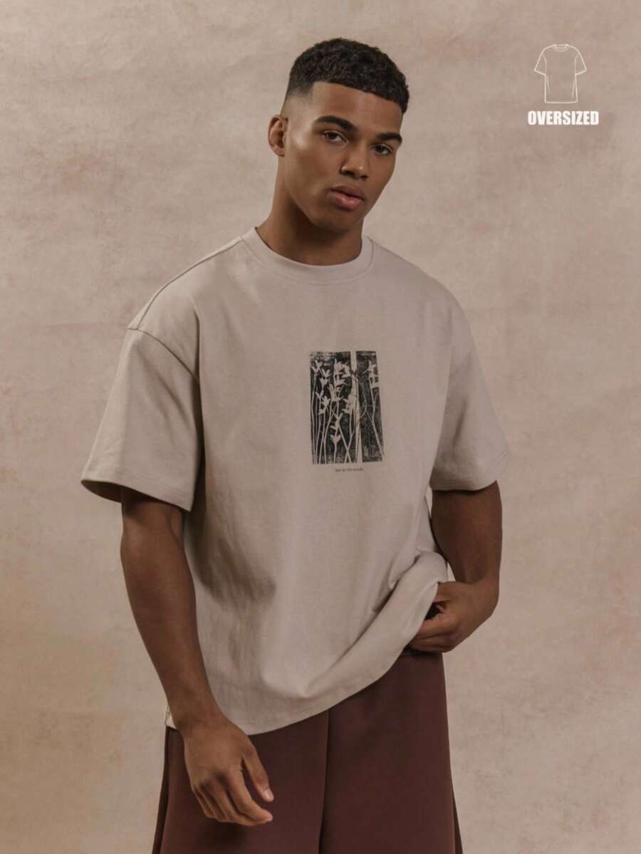 Embrace effortless spring and summer style with the Musero Oversized Floral Box Graphic Print T-Shirt. Featuring a bold, artistic floral design in a classic box graphic layout, this relaxed-fit tee offers comfortable everyday wear with contemporary flair. The oversized silhouette provides a modern, laid-back aesthetic perfect for casual outings, layering, or making a statement on its own. Crafted for breathability and ease, it's an essential addition to your warm-weather wardrobe.