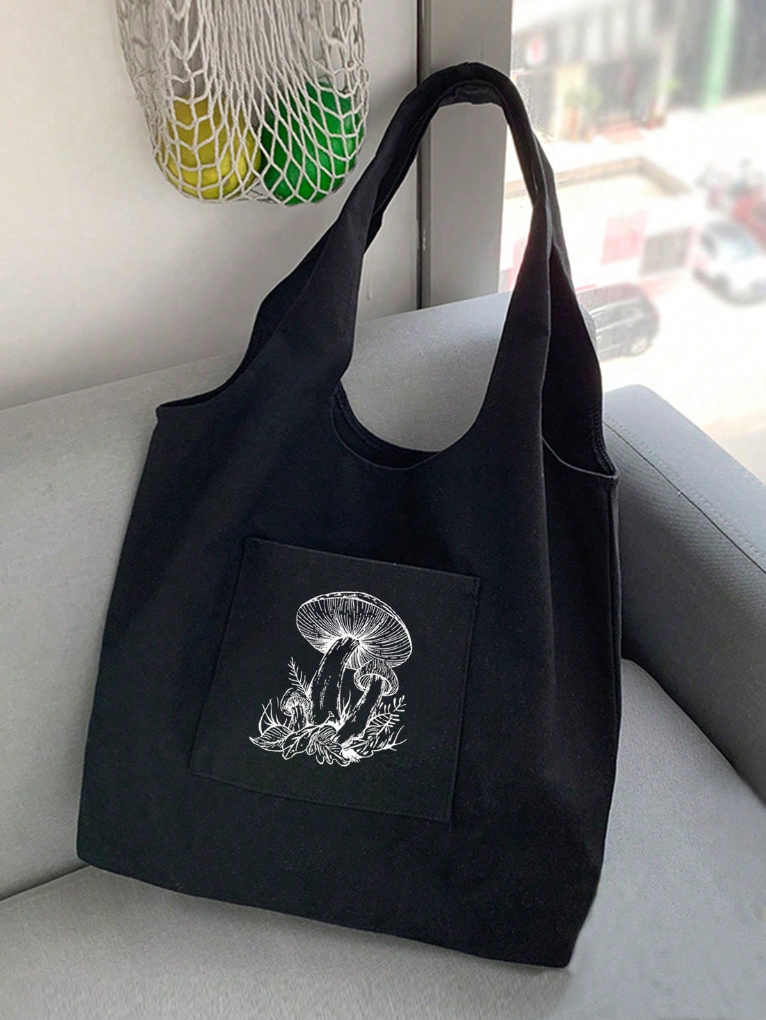 Introducing Mushroom Madness: The perfect blend of fashion and minimalism. Crafted from high-quality canvas, this tote bag is not only stylish but also durable. With its spacious interior and sturdy handles, it's the ideal accessory for any occasion. A must-have for mushroom lovers and anyone looking for a unique gift.