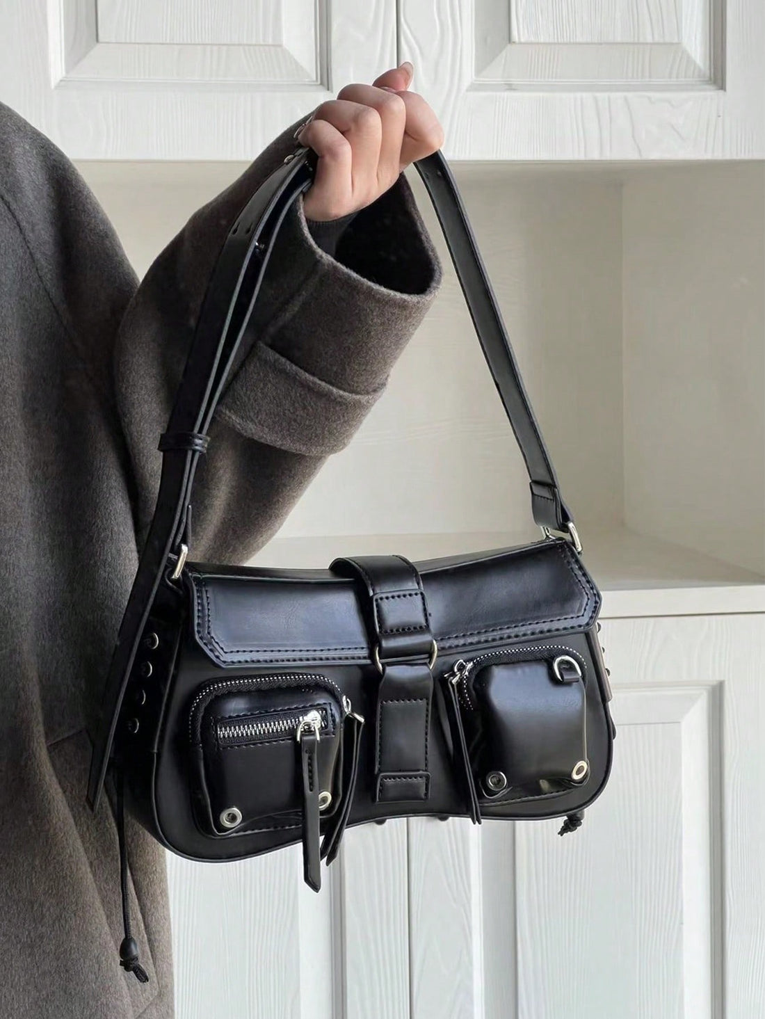 Elevate your fashion game with our New Shoulder Bag. Featuring a Grunge Y2K Hippie design, this bag is perfect for cool girls looking to make a statement. With its unique style and functionality, you'll stand out from the crowd and turn heads wherever you go. 