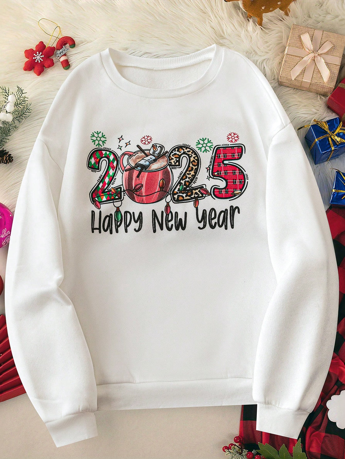 Get ready to embrace the New Year with our New Year Vibes sweatshirt! Featuring a relaxed fit and a stylish graphic on the crew neck, this sweatshirt is perfect for the cozy nights ahead. Show off your New Year spirit in comfort and style.