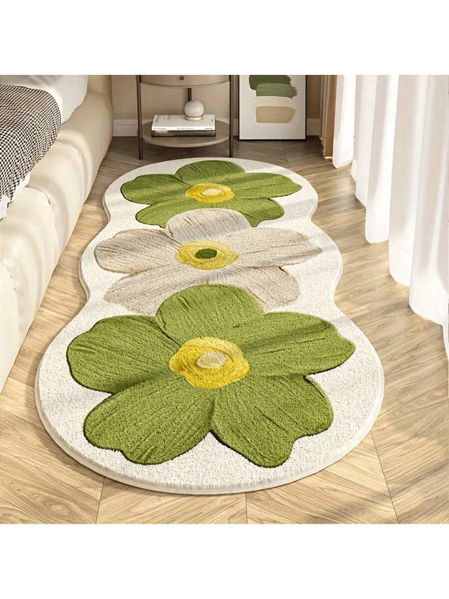 Bring Nordic elegance into your home with this plush area mat, featuring a delicate floral design in soothing mint green. Crafted from soft polyester, it adds warmth and comfort underfoot while complementing any room's décor. The non-slip backing keeps the mat securely in place on hardwood, tile, or carpet, making it perfect for living rooms, bedrooms, or entryways. Easy to clean and maintain, this washable rug resists stains and wear, ensuring lasting beauty and functionality. 