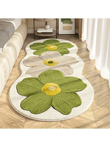 Bring Nordic elegance into your home with this plush area mat, featuring a delicate floral design in soothing mint green. Crafted from soft polyester, it adds warmth and comfort underfoot while complementing any room's décor. The non-slip backing keeps the mat securely in place on hardwood, tile, or carpet, making it perfect for living rooms, bedrooms, or entryways. Easy to clean and maintain, this washable rug resists stains and wear, ensuring lasting beauty and functionality. 