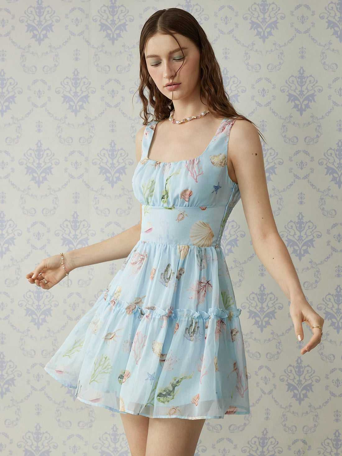 Be the life of the party (and the beach) with our Ocean Breeze Chiffon Dress! This floral outfit is the perfect combination of fun and elegance, making you stand out in any crowd. Soak up the sun and enjoy the refreshing ocean breeze in style.