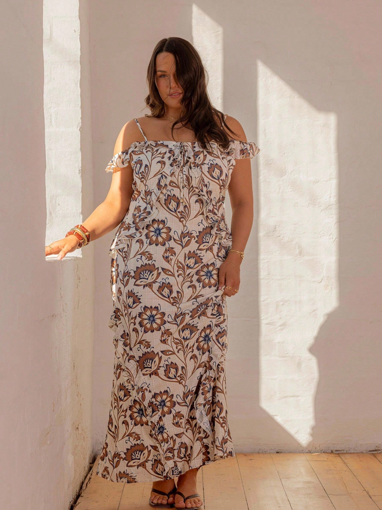 Turn heads on your next getaway with this Off-Shoulder Ruffle Maxi Dress. Its playful ruffles and flattering bodycon fit highlight your silhouette while keeping things breezy and fun. Perfect for beach strolls or sunset dinners, this dress brings vacation vibes wherever you go.