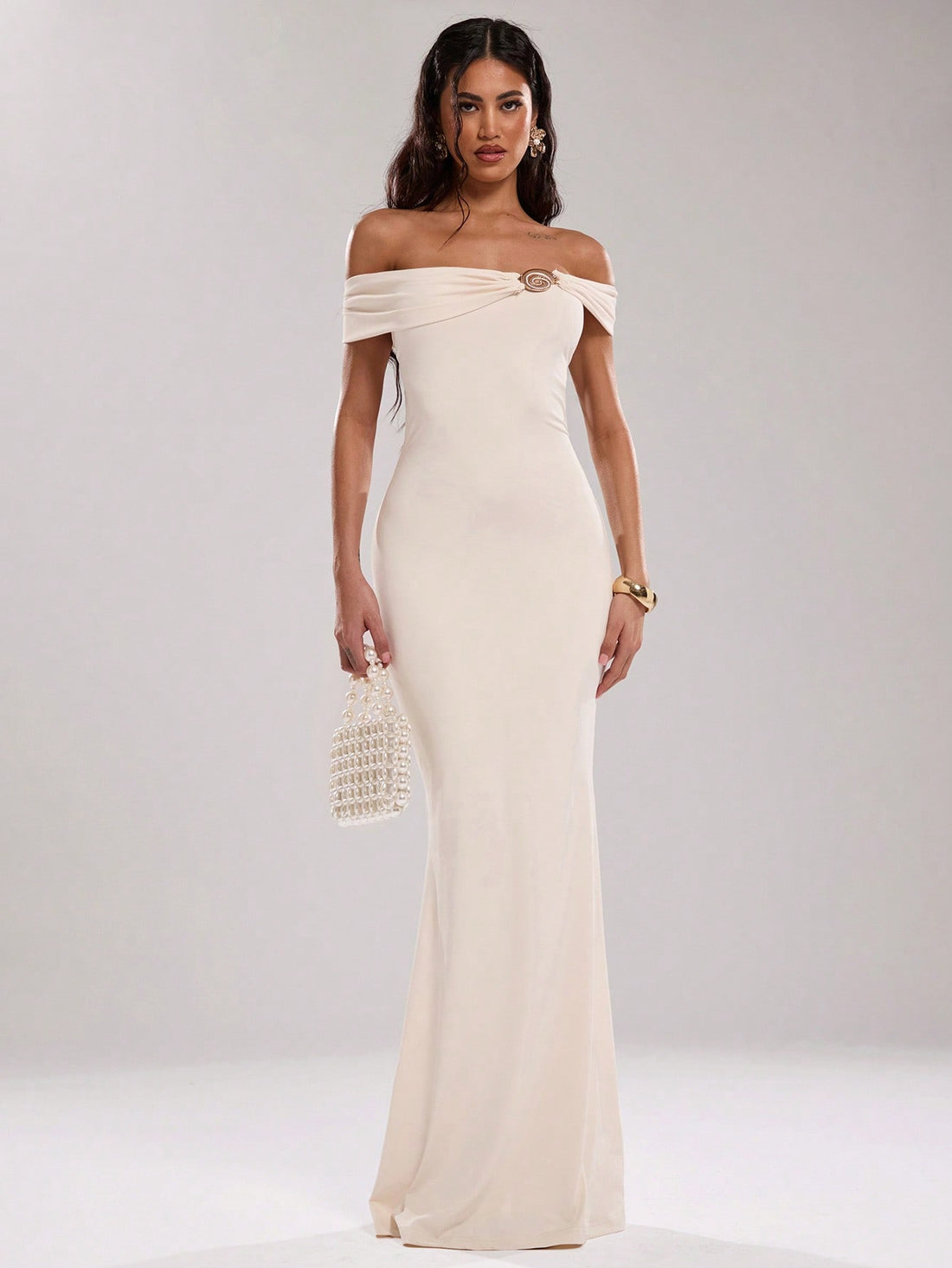 Get ready to turn heads in our Off-Shoulder Seashell Dress! With a sexy backless design and a stunning fishtail hem, this dress is perfect for both banquets and vacations. The metal buckle adds a touch of glam, making you the center of attention wherever you go. Say hello to your new go-to dress!