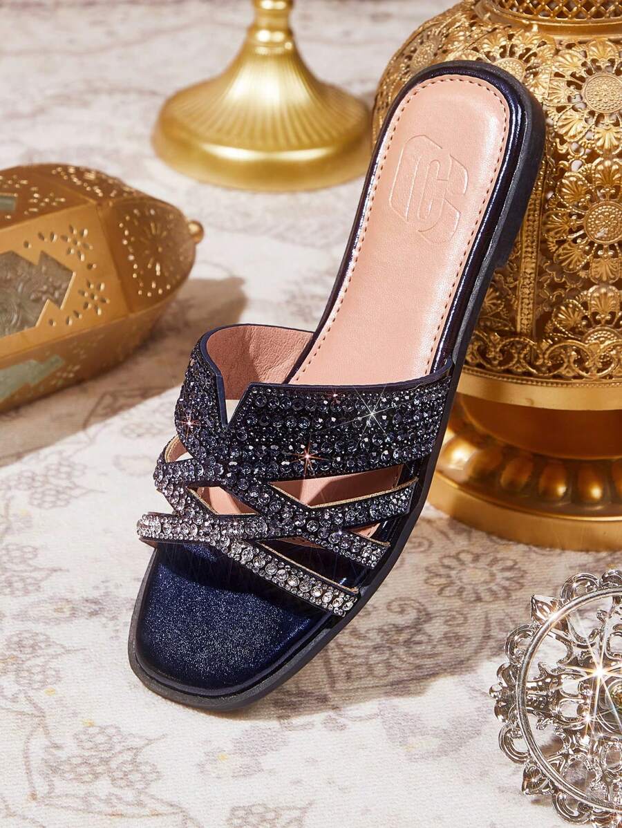 Step into sparkle with these Ombre Golden Glitter Rhinestone Slip-On Slippers! Perfect for adding a touch of glam to your spring and Easter celebrations, these trendy party sandals combine comfort and shine effortlessly. The dazzling rhinestones catch the light with every step, making you the star of any casual gathering. Slip them on and let your feet do the sparkling!