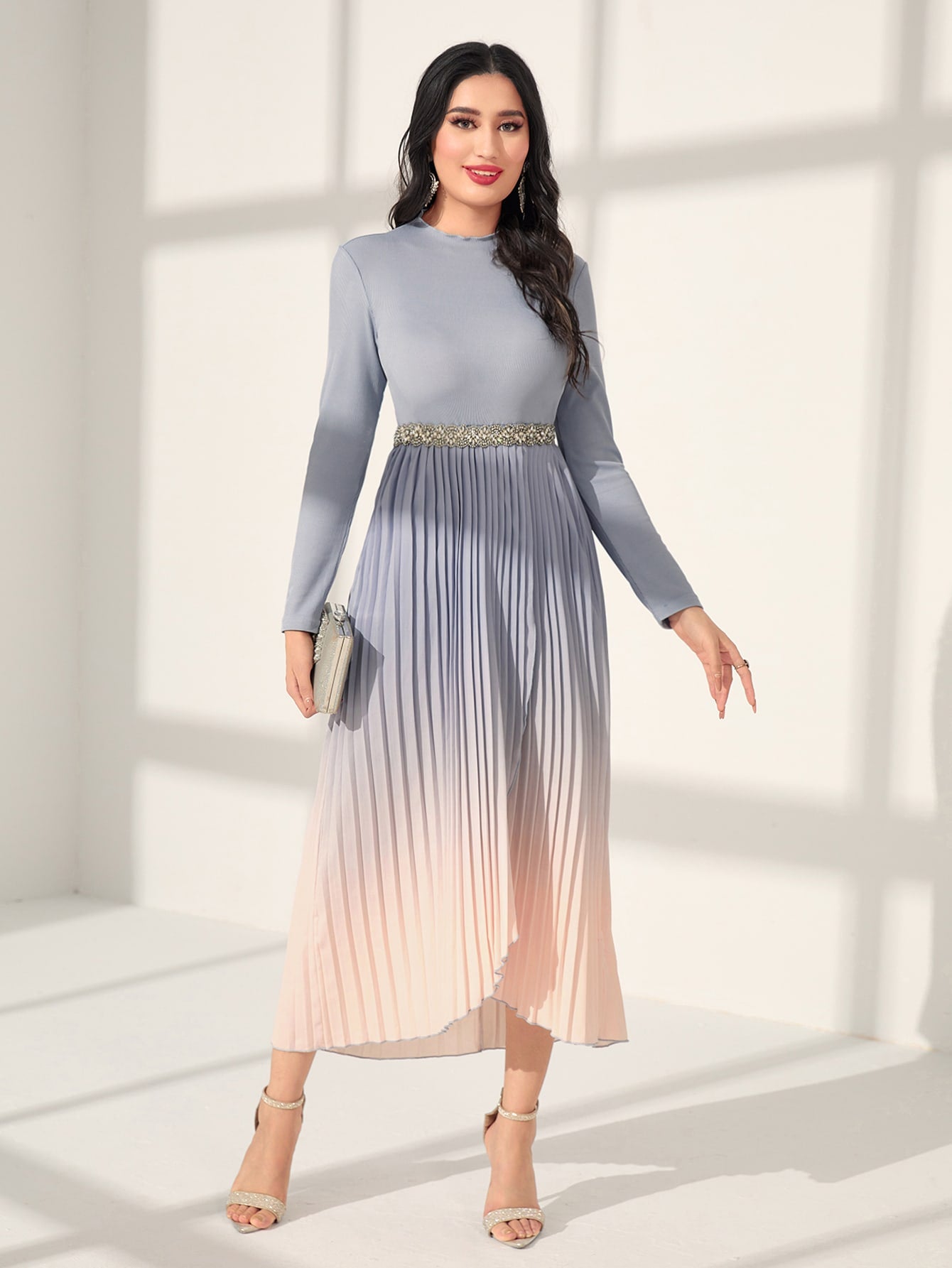 Elevate your wardrobe with our Ombre Pleated Hem Dress. Featuring a chic gradient design, this dress exudes elegance for any occasion. The pleated hem adds a touch of sophistication, while the ombre effect adds depth to your look. Elevate any event with this stylish and versatile dress.