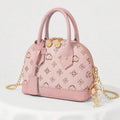 Light pink PU leather mini dome handbag with brown monogram print top handles gold chain strap zipper closure and starfish pearl charm