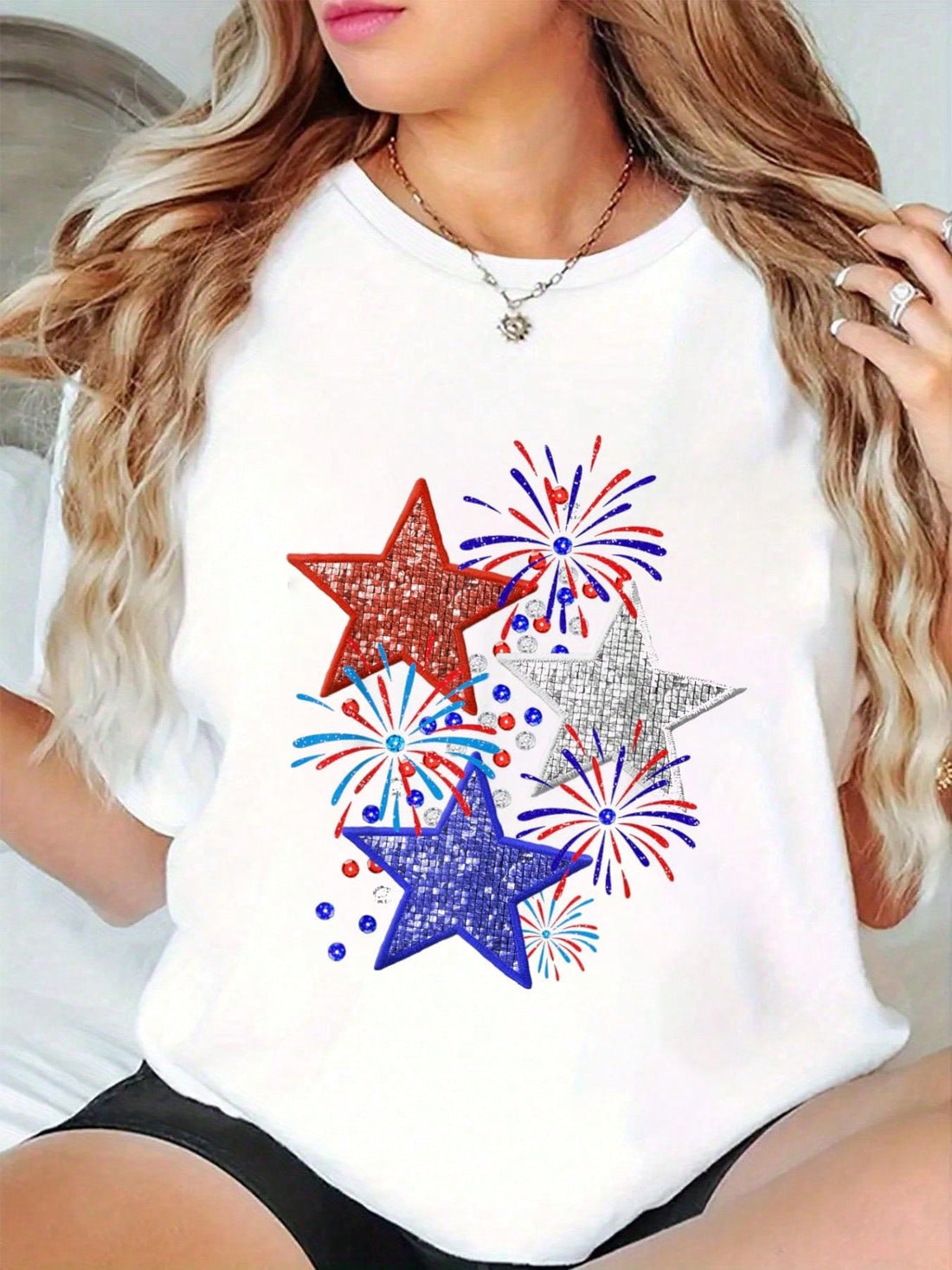 Celebrate Independence Day in style with this playful women's graphic tee featuring vibrant red, white, and blue fireworks. Perfect for showing your patriotic spirit, this comfortable shirt adds a festive touch to any 4th of July gathering or summer outing.