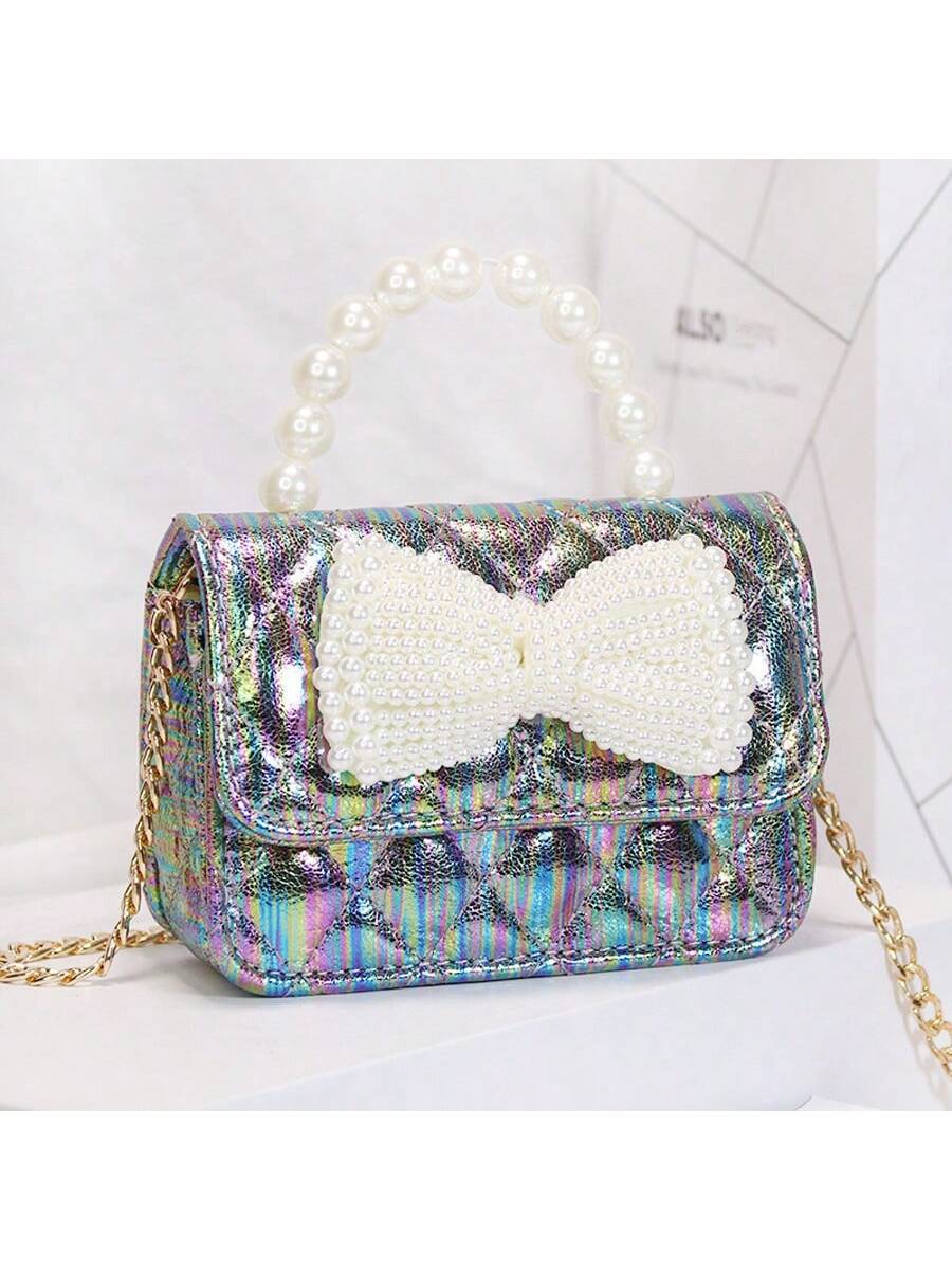 Elevate your style with Pearl Bow Bliss: Korean Style Crossbody Bag for Women. This elegant bag features a chic pearl bow design, adding a touch of sophistication to any outfit. The crossbody style offers convenience and functionality, making it the perfect accessory for any fashion-forward woman. Upgrade your look with this Korean-inspired bag.